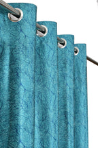Aqua curtains with Camrin texture by The Digital Kart hanging in a window, showcasing soft, textured fabric and vibrant color.