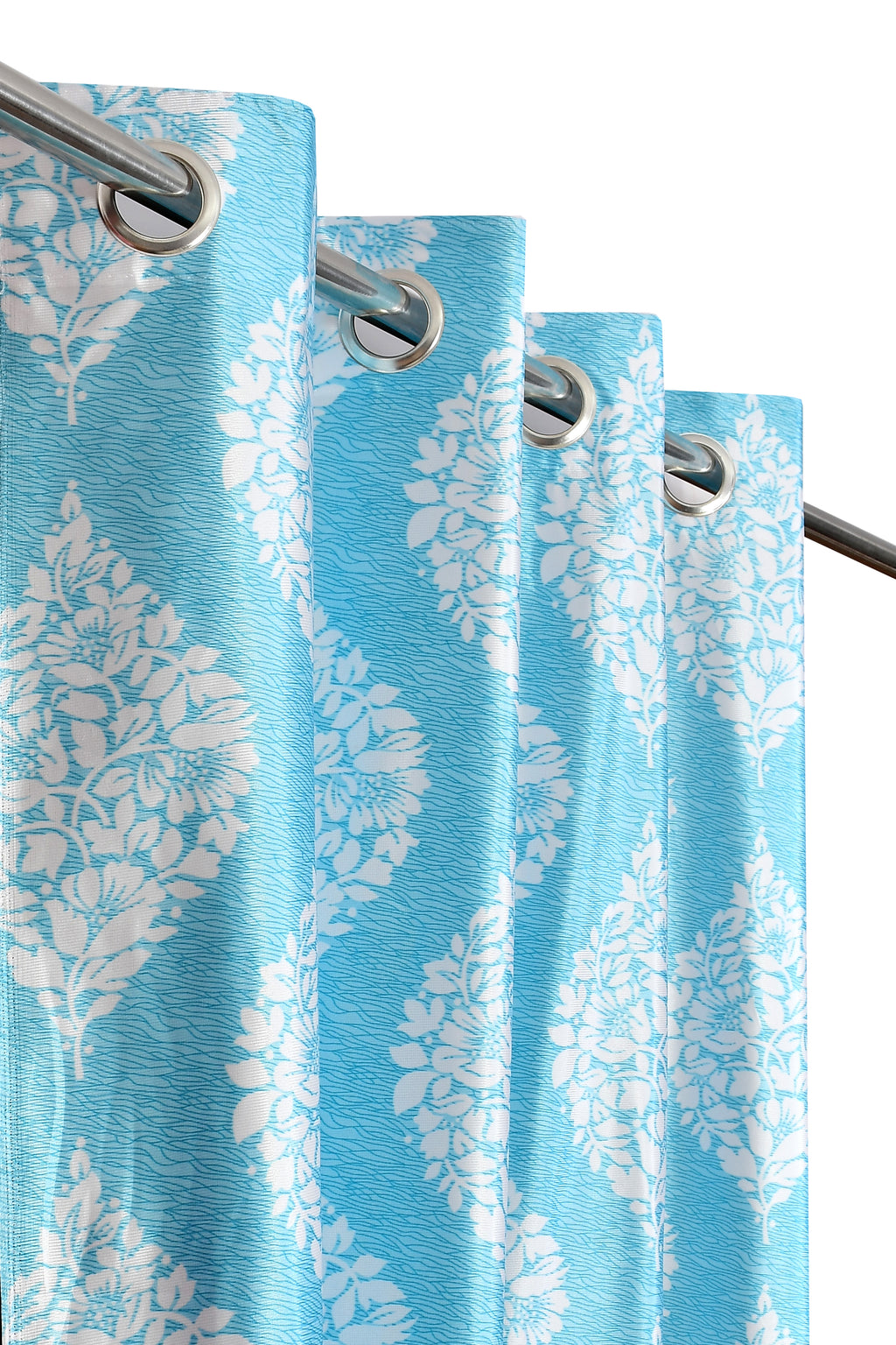 Aqua Surbhi Dmass print curtains by The Digital Kart hanging in a window with floral and geometric patterns.