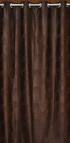 Brown tree punch curtains from The Digital Kart featuring a bold, nature-inspired tree punch pattern.