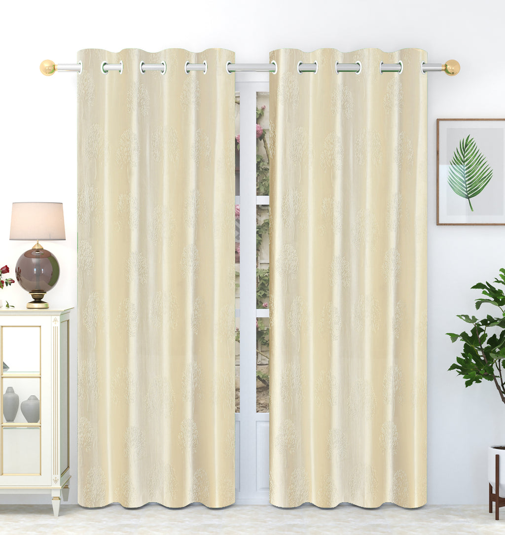 Cream tree punch curtains from The Digital Kart featuring a decorative punched pattern, ideal for adding elegance to any room.