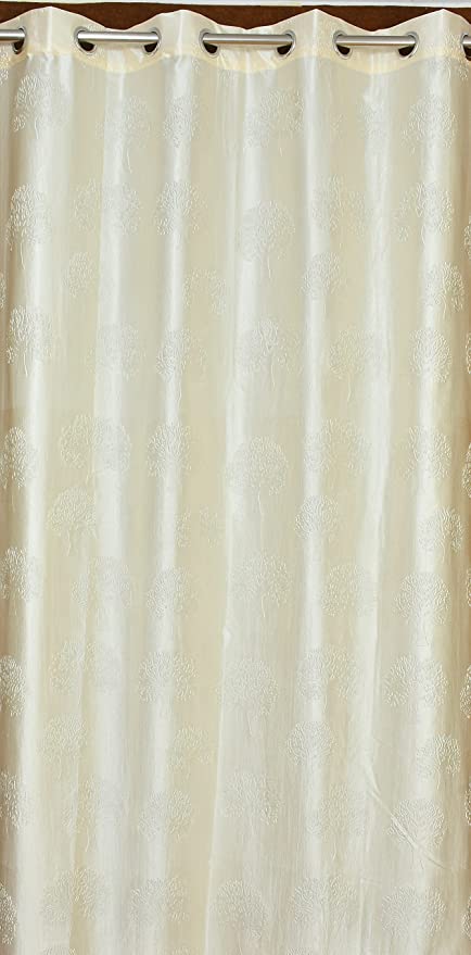 Cream tree punch curtains from The Digital Kart featuring a decorative pattern, perfect for adding elegance to living spaces.