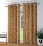 Golden Surbhi Super Star print curtains from The Digital Kart hanging on a window with intricate star patterns.