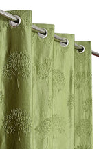 Green tree punch curtains from The Digital Kart featuring a vibrant, leafy pattern perfect for adding a natural touch to any room.