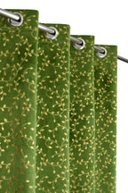 Green velvet curtains with foil detailing from The Digital Kart, showcasing a luxurious fabric and elegant drape.