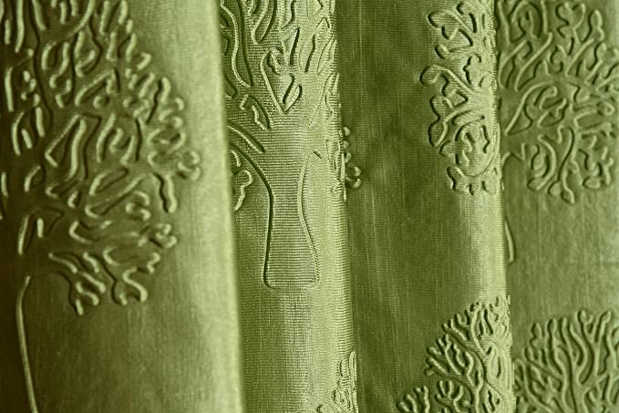 Green tree punch curtains from The Digital Kart featuring a vibrant leaf pattern on lightweight fabric.