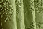 Green tree punch curtains from The Digital Kart featuring a vibrant leaf pattern on lightweight fabric.