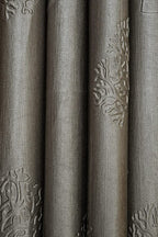 Grey Tree Punch Curtains by The Digital Kart hanging smoothly on a window, showcasing modern floral design and fabric texture.