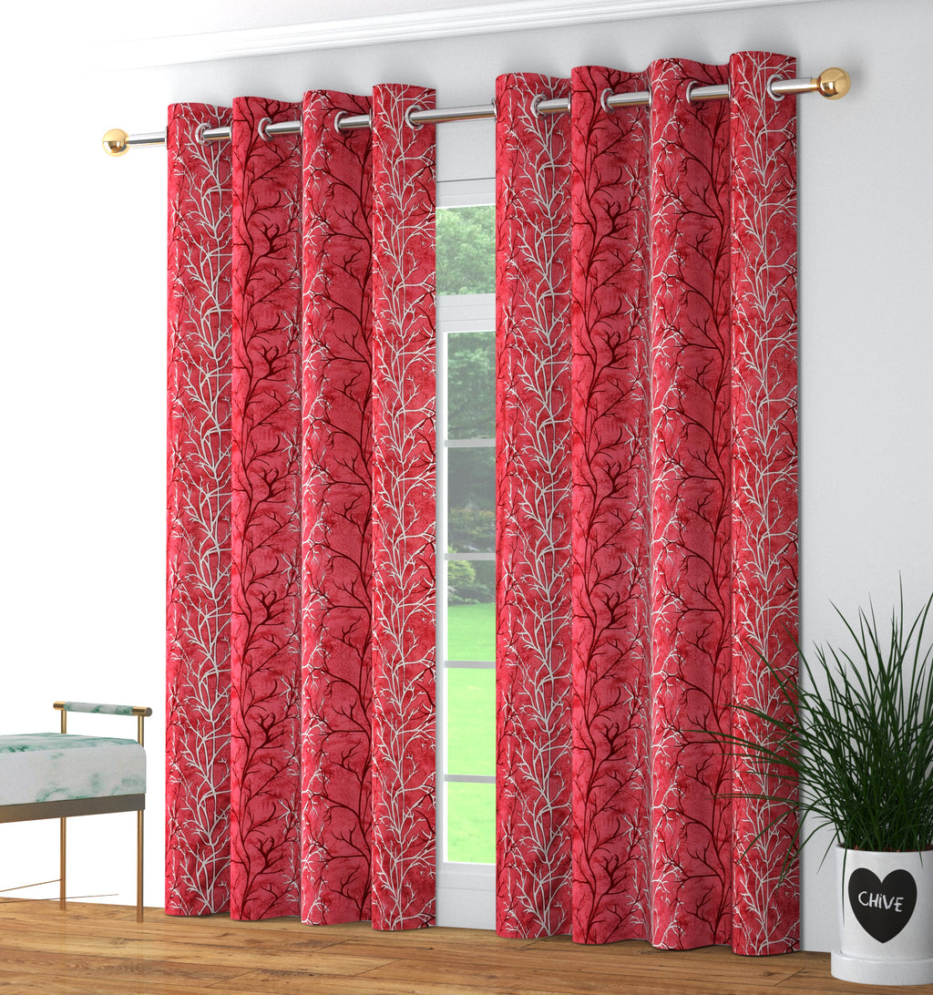 Maroon Surbhi super star print curtains from The Digital Kart hanging on a window, showcasing vibrant star patterns and elegant design.