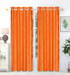 Orange tree punch curtains from The Digital Kart featuring a vibrant tree punch pattern for stylish window decor.