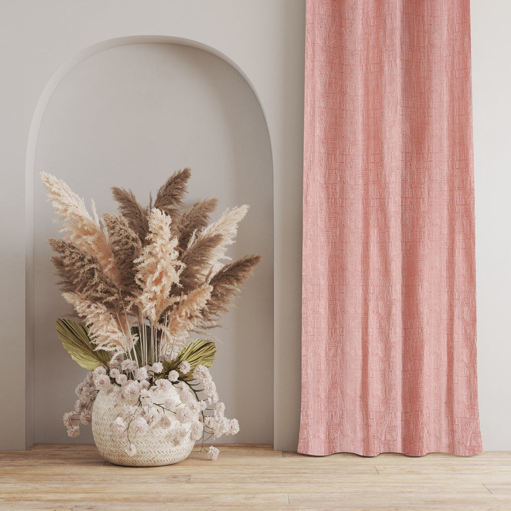 Peach-colored Maya curtains from The Digital Kart hanging in a window with soft natural light.