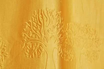 Yellow tree punch curtains from The Digital Kart featuring a vibrant tree pattern on lightweight fabric.
